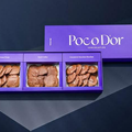 علبة PocoDor blue selection بتشكيلة شوكولاتة فاخرة وتصميم أزرق أنيق